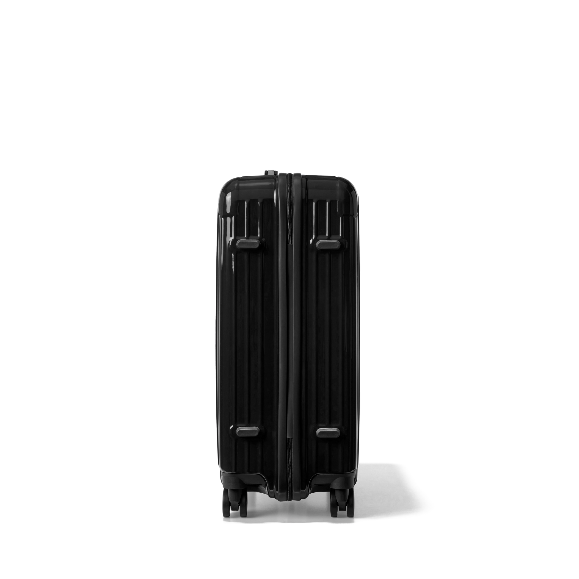 Reiskoffer Zwart Medium Essentials | Voyagoux zijkant