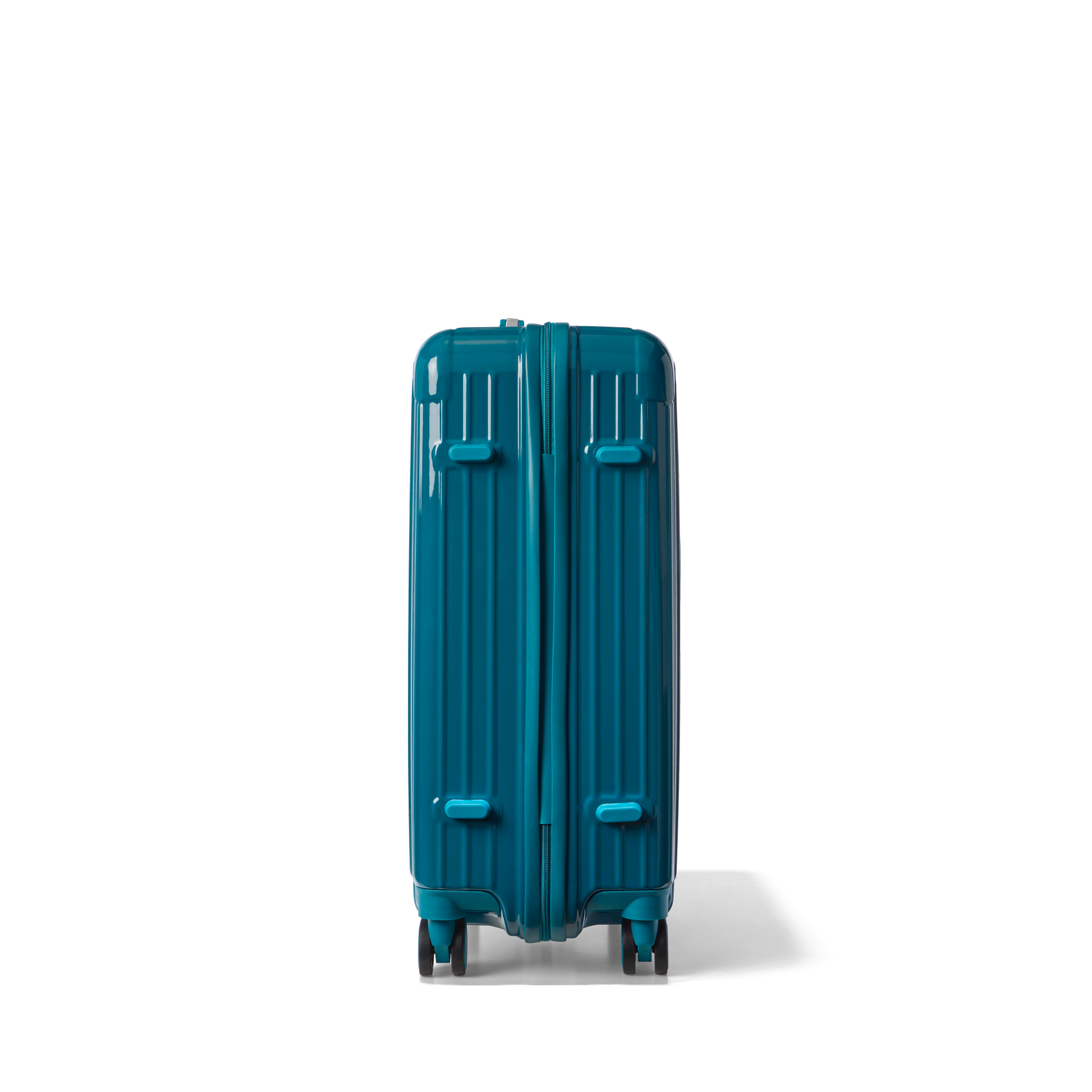 Reiskoffer Lichtblauw Medium Essentials | Voyagoux zijkant