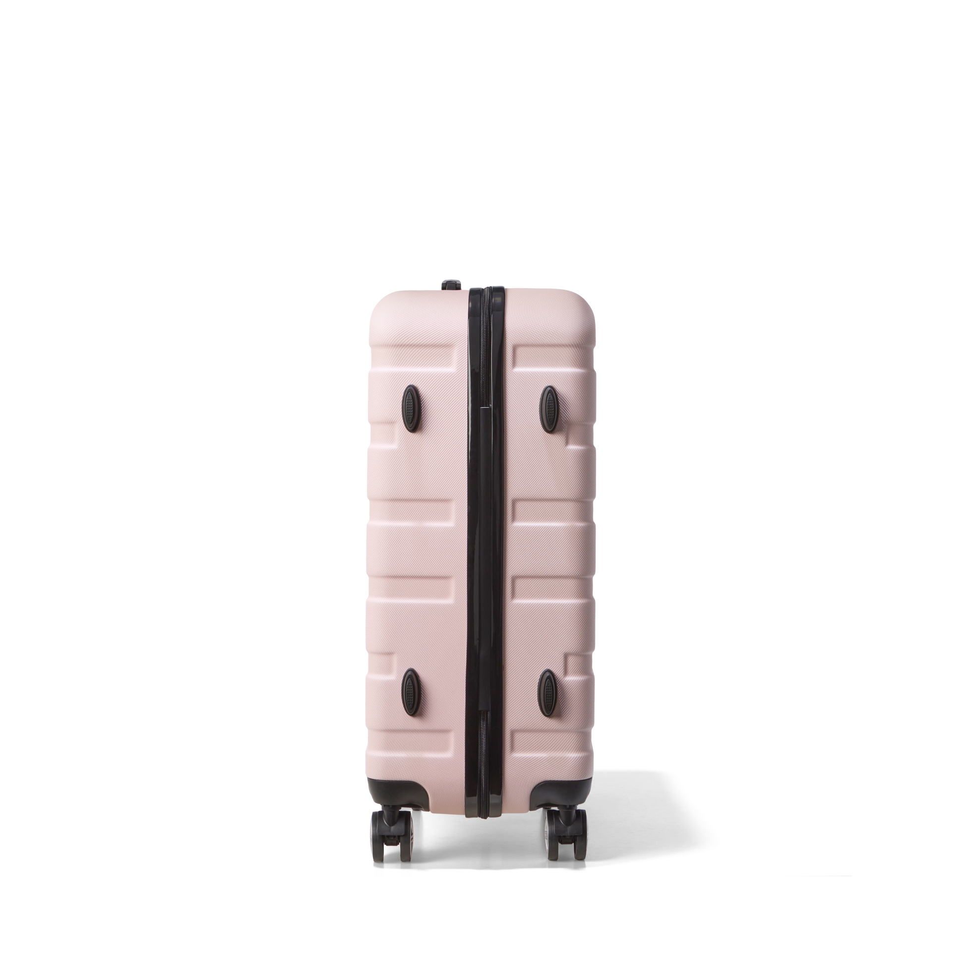 Reiskoffer Lichtroze Medium Revelation | Voyagoux zijkant